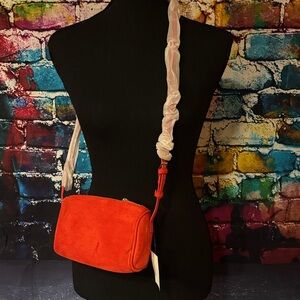 Red Cross body faux suede